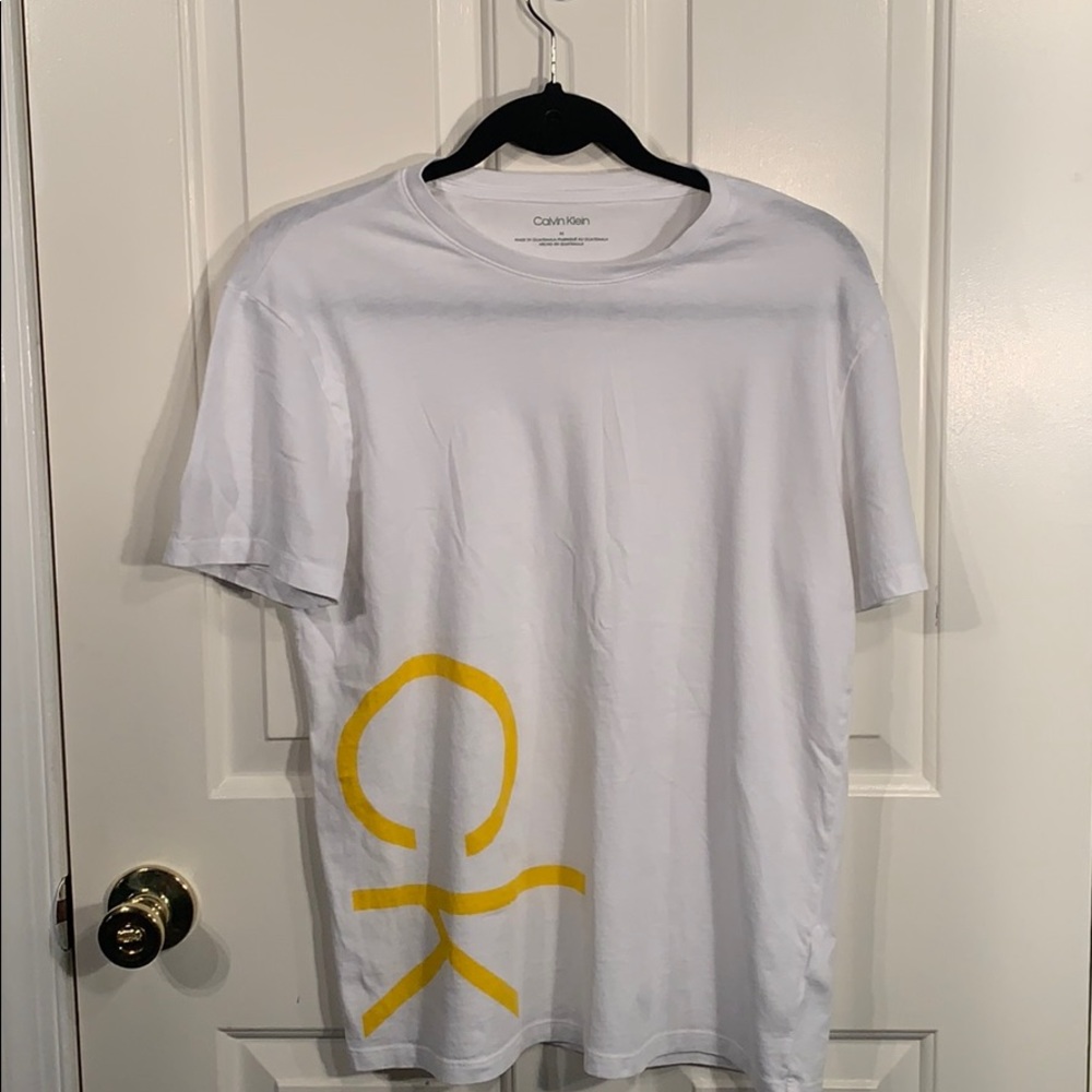White and yellow Calvin Klein logo Tee size medium
